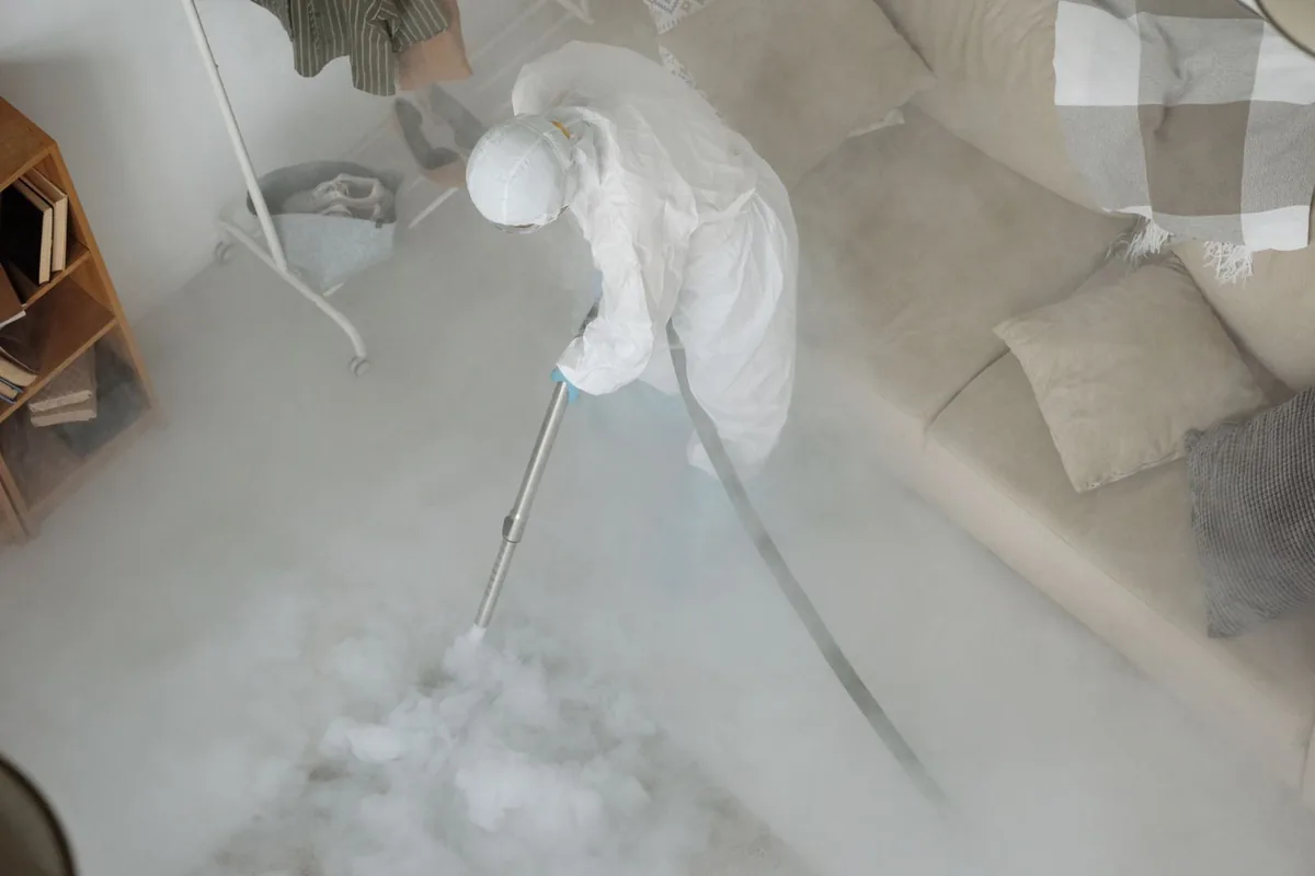 Biohazard cleanup technician in protective equipment, Tecumseh, MI